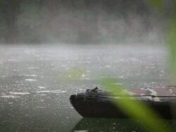 MS Shot of Force Recon soldiers in camouflaged folding boat moving in river during reconnaissance mission in jungle with light machine gun in his arms / Swamp, Virginia, United States Stock Footage