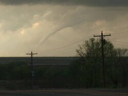WS View of rope tornado over road and telephone poles / Lakeview, Texas, United States Stock Footage