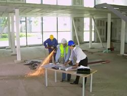 HD CRANE: Construction Engineers Examining The Blueprints Stock Footage