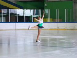 HD: Beautiful Young Women Performing Ice Skating Stock Footage