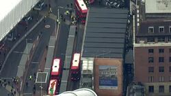 Aerial shots of commuters outside of London Victoria station during underground strike News Clip