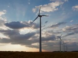 Time Lapse at sunset of a windfarm in Beauce - France Stock Footage