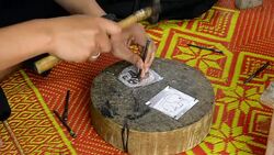 Silver art handicrafts of Lanna, Thai style, Chiang Mai, Thailand, hand banging on silver with a hammer. Stock Footage