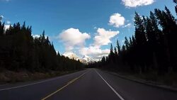 POV vehicle driving on scenic road Stock Footage