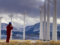 Field Technician Inspecting Wind Turbines Stock Footage
