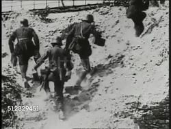 1917: WWI GERMAN TROOPS: German soldiers walking over rocky hillside. XWS Multiple explosions in open field, lots of smoke, possibly poison gas from 'White Star' shells.  Chemical Weapons, Warfare, 'the chemists' war' Instructional Video
