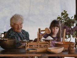 Cooking With Grandma-Beautiful Little Girl Learns How To Make Cookies  in The Bright-lit Vintage Kitchen Stock Footage