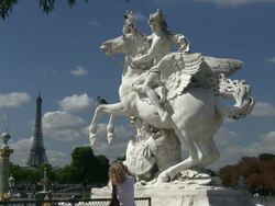 MS Woman taking picture of statue / Paris, Ile-de-France, France    Stock Footage