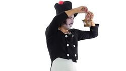 Mime artist looking at easter eggs. Stock Footage