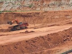 Coal mine. The dredge loads the truck coal Stock Footage