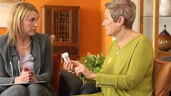 Healthcare Professional Discusses Medication with Patient Stock Footage