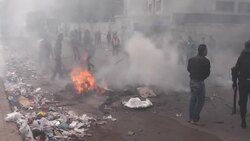 Islamist supporters battle riot police in protests ahead of key referendum News Clip