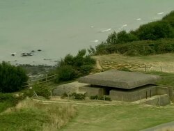 AERIAL, ZO, German bunker on cliff top, Pointe du Hoc, Normandy, France Stock Footage