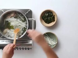 CU Shot of adding seaweed into boiling soup / Seoul, South Korea Stock Footage