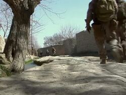 WS Group of soldiers walking / Mausa Qala, Helmand Province, Afghanistan. Stock Footage