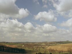 WA T/L clouds over rural landscape, Cotswolds, England, UK Stock Footage