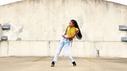 MS Woman dancing on rooftop of building Stock Footage