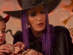 HD: Mother And Two Children Eating Halloween Pastries Stock Footage