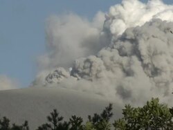 Steam and ash pour from Kirishima volcano Shinmoe crater / AUDIO Stock Footage