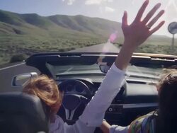 Woman enjoys car ride Stock Footage