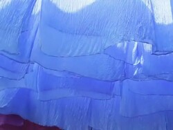 Skeins of Fabric hung out to dry in the dyers souk, Marrakech, Morocco, Africa Stock Footage