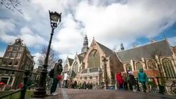 HD time-lapse: Amsterdam Canal with Old Church Netherlands Stock Footage