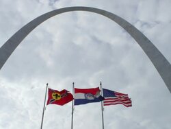MS Shot of flags flying in St. Louis Gateway Arch / St. Louis, Missouri, United States Stock Footage