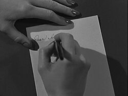 Woman writing note Stock Footage