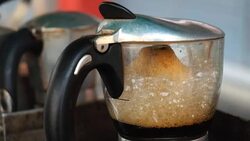 moka pot use coffee maker with hot coffee Stock Footage