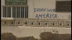 'Down With America' Written On Wall In Umm Qasr News Clip
