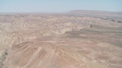Rugged ravines snake through the vast Fish River Canyon in Namibia. Stock Footage