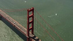 Boats sail past the Golden Gate Bridge in San Francisco Bay. Stock Footage