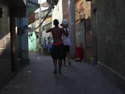 Football In Brazil - Morro Da Sao Carlos Favela Stock Footage