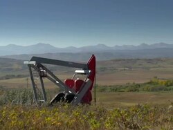 HD TIME LAPSE: Pump Jack in Foothills Stock Footage