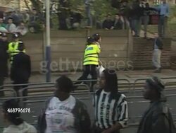 Police Leading Away Anti-Poll Tax Protester News Clip