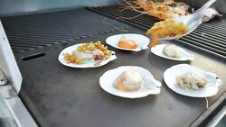 Beautiful chef cooking seafood Stock Footage