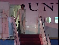 US Sec of State arrives at airport, shakes hands with officials News Clip