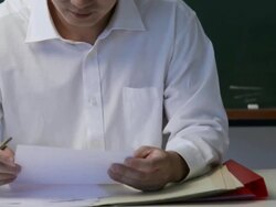 MS Man writing math equations on blackboard / Singapore Stock Footage
