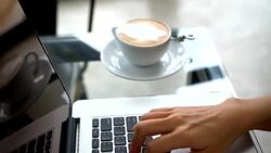 Closeup On Woman's Hand Typing On A Laptop Keyboard Stock Footage