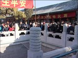 Chinese visit temple on first day of year of the ox News Clip