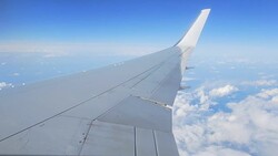 View of the clouds from airplanes window during the flight Stock Footage