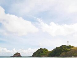 Moving cloud sky over lighthouse Stock Footage