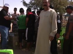 Yazidi Refugees Receive Food Aid News Clip