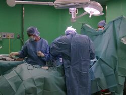  MS Two doctors operating on patient / Cagliari, Sardinia, Italy Stock Footage