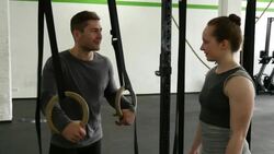 Discussing gymnastic ring exercises Stock Footage