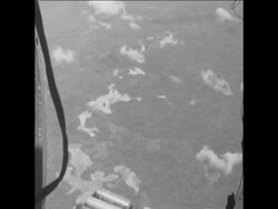 CAN331 SUPPLIES DROPPED BY AIR IN BAN NA AND GENERAL STREET SCENES IN VIENTIANE Instructional Video