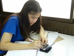 side view Thai woman short note for reading. Stock Footage