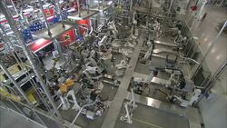 Robots work in an automobile production factory. Stock Footage