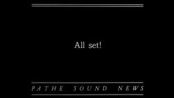 Whippets chase rabbit lure around racetrack; race winner enjoys dog biscuit News Clip