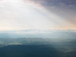 HD:sunshine through mountains near storm came. Stock Footage